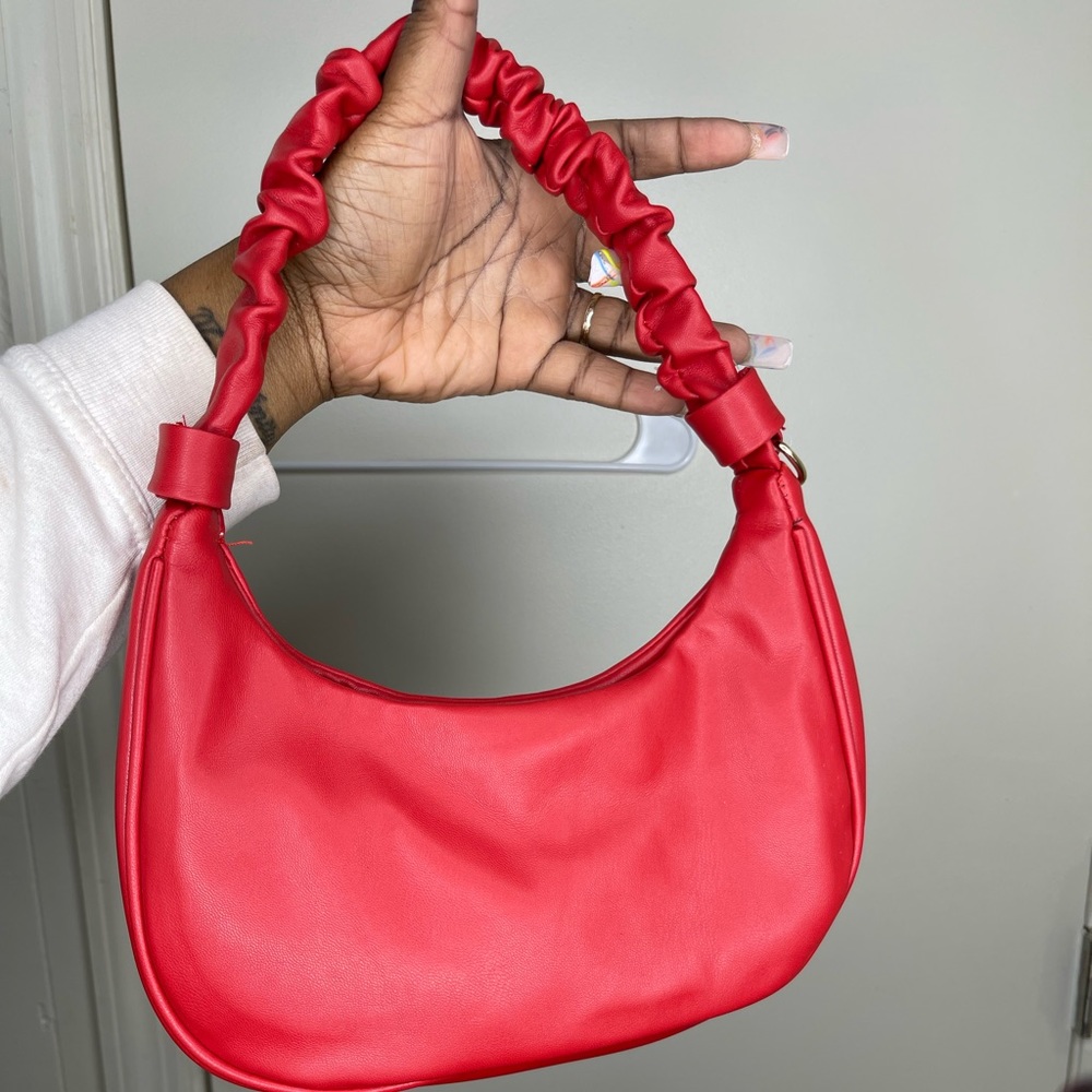 Red faux leather mini hand bag